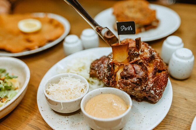 Award-Winning Prague Evening Old Town Food and Drink Tour - Old Town Square between plates and stories