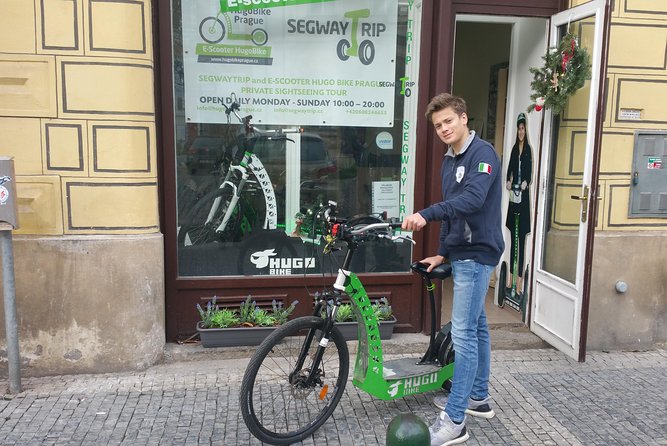 Best Prague Viewpoints: Guided E-Scooter Tour - National Theatre, Strahov Monastery, and Prague Castle architecture
