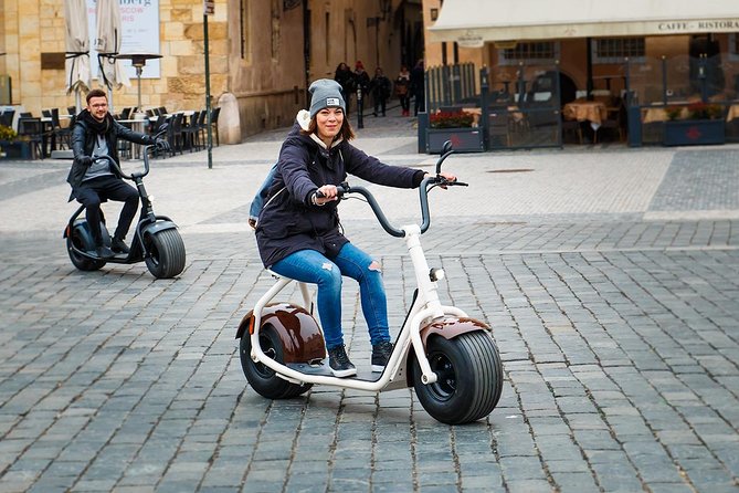 Grand city tour on Scrooser in Prague - The Lennon Wall and Lesser Town