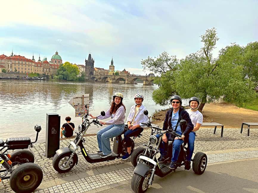 Heart of Prague tour on Tricycle electric scooter - Franz Kafka Museum and the riverside statues