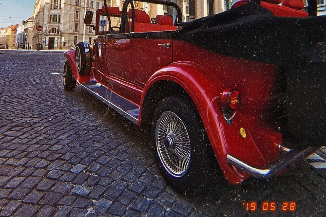 Karlstejn Castle in Vintage Convertible Car - A closer look at the $677.02 price