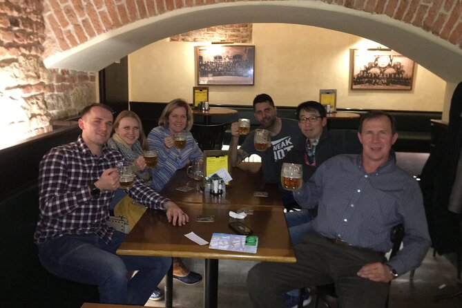 Old Prague pubs tour. Beer and dinner included! - Crossing Charles Bridge between Old Town and Lesser Town