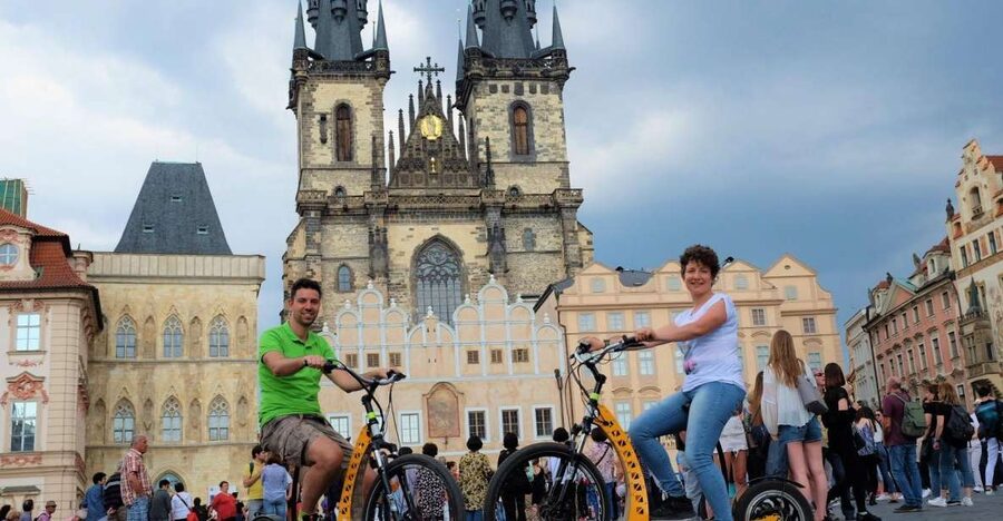 Prague: 2-Hour Old District & Riverside E-Scooter Tour - Language, pace, and comfort