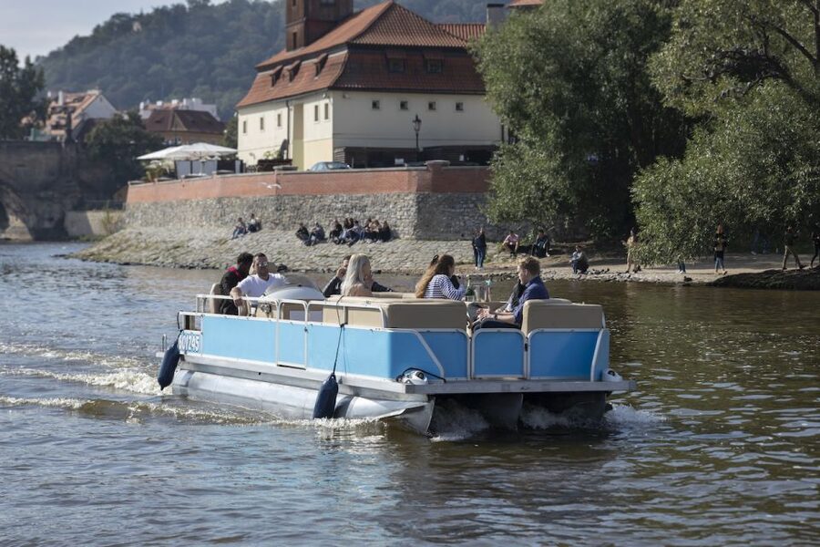 Prague: Beer Boat Tour - The National Theatre and the changing riverfront