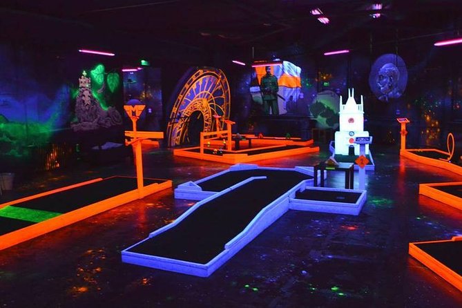 Prague Black Light Mini Golf and Games with free Drinks - A glowing take on Prague sightseeing
