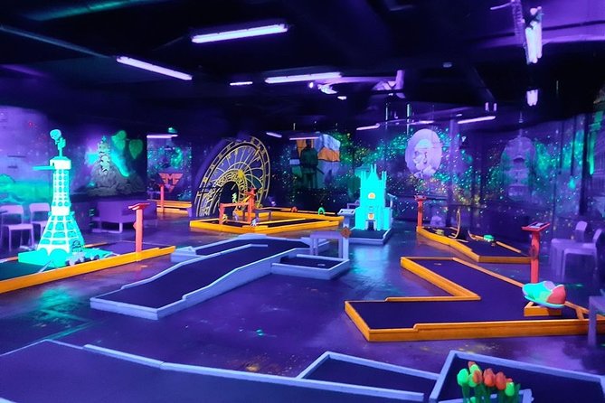 Prague Black Light Mini Golf and Games with free Drinks - Prague artwork, glowing paint, and photo opportunities