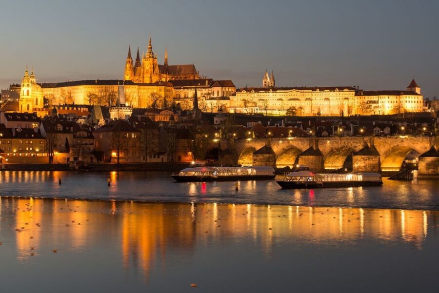 Prague: City Tour and Dinner Cruise with Hotel Pickup - Boarding the Vltava boat for the three-hour cruise