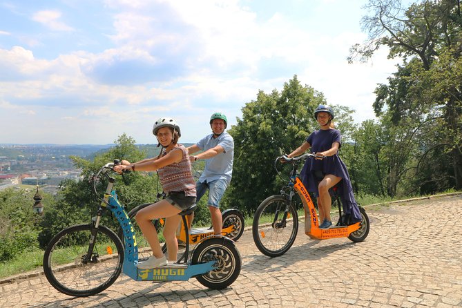 Prague: electric scooter & E-bike guided tour - Kafka’s sculptures and Charles Bridge