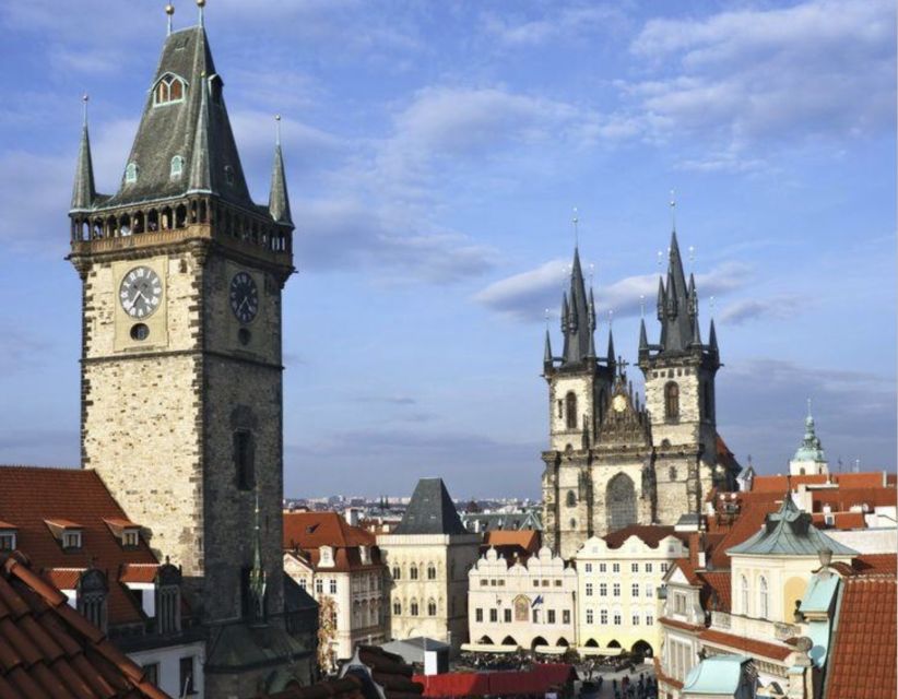 Prague: Half-Day City Highlights Walking Tour - Charles Bridge, where the route slows down