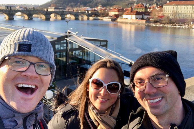 Prague Highlights 4 Hour Private Walking Tour - Crossing Charles Bridge toward Malá Strana