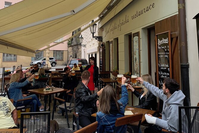 Prague Historic Pub Tour with Drinks Included - What the guides add to the experience