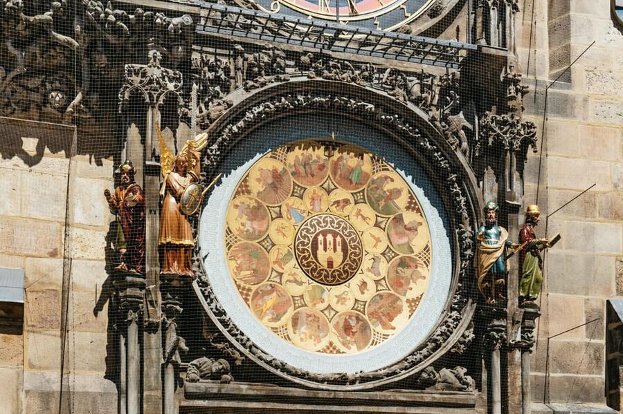 Prague: Old Town, Astronomical Clock and Underground Tour - Crossing Charles Bridge with a story in every span