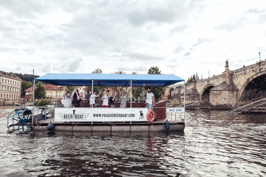 Prague: Private Cycle Boat River Tour with Beer or Prosecco - Finding the blue-roofed boat