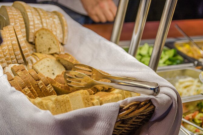 Prague: Sightseeing Boat Cruise with Buffet Dinner - Comfort, access, and who will enjoy it most