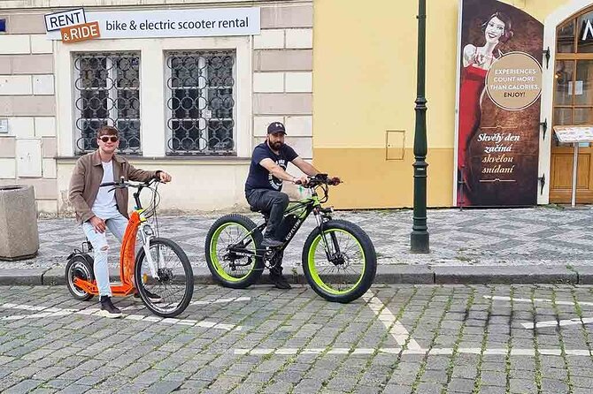 Prague Trike & e-Scooter Tour: Castle Viewpoints & Charles Bridge - Tiny streets and Kafka’s mischievous statues