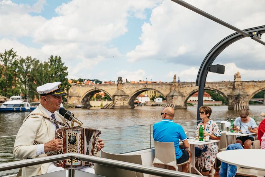 Prague: Vltava River Lunch Cruise in an Open-Top Glass Boat - Music that keeps the meal moving