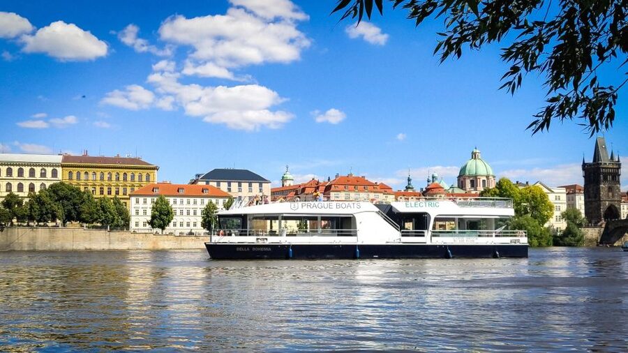 Prague: Vltava River Sightseeing Cruise - Indoor tables, outdoor photos, and onboard service