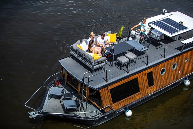 Prague YachtBoat CLASSIC cruise with Unlimited Beer or Prosecco - Dancing House and National Theatre from the water