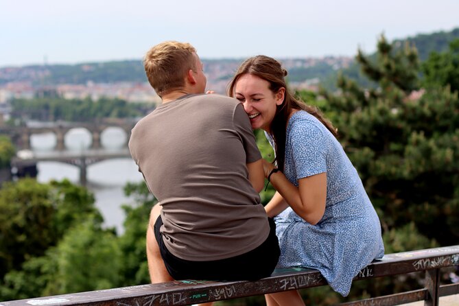 Private Prague Photoshoot for Individuals, Couples and Families - Crossing Charles Bridge with the castle behind you