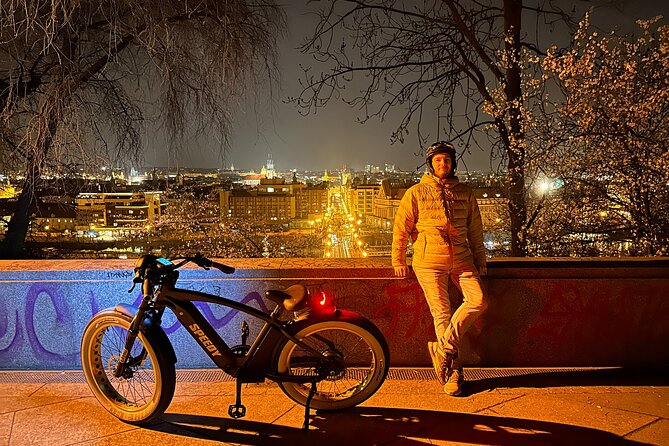 Retro Style E-Bike Night Tour in Prague - Live Guided - Lennon Wall and the river add a different side of Prague