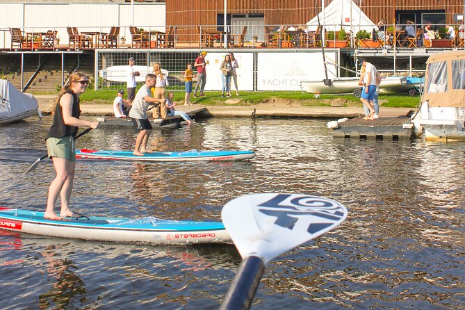 Stand-Up Paddleboarding on the Vltava River in Prague - Paddling toward Prague Castle and Charles Bridge