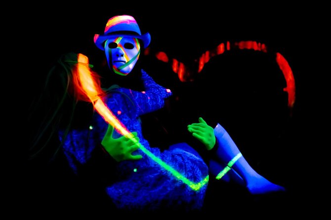 Underground Black Light Theatre Interactive Show in Prague - The story moves from first meeting to dark dreams