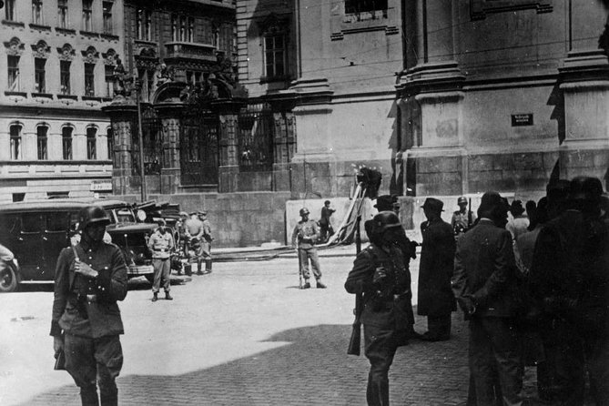 WWII Secrets of Prague: Small Group Tour with Crypt Visit - Entering the crypt beneath the church